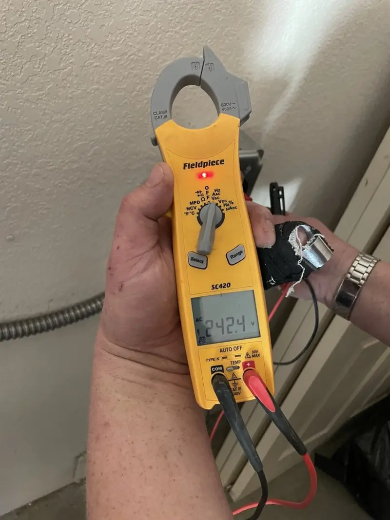 Voltage testing with clamp meter during Circuit Breaker Repair in Anderson
